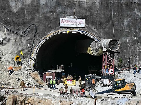 Rescue personnel work at the mouth of the collapsed under construction Silkyara tunnel in the Uttarkashi district of India's Uttarakhand state.
