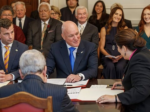 New Zealand Prime Minister Christopher Luxon talks with with Governor-General Dame Cindy Kiro during the swearing-in ceremony at Government House in Wellington on November 27, 2023.