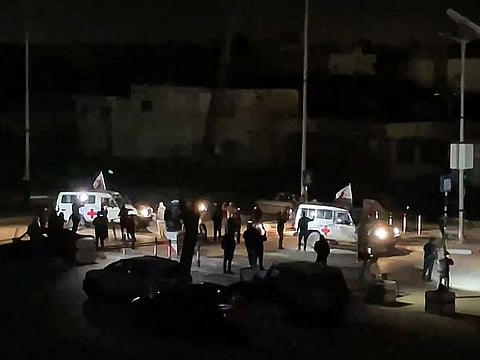 International Red Cross vehicles reportedly carrying hostages released by Hamas driving towards the Rafah border point with Egypt ahead of their transfer to Israel..