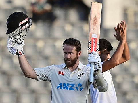 New Zealands Kane Williamson (left) celebrates after scoring a century during the second day of first Test match against Bangladesh at the Sylhet International Cricket Stadium on Wednesday.