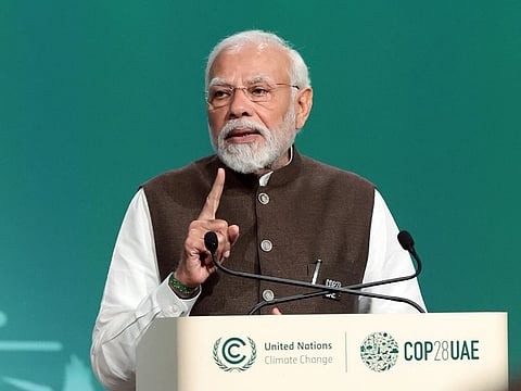 India Prime Minister Narendra Modi speaks at the High-Level Segment for Heads of State and Government session during the United Nations climate summit in Dubai on December 1, 2023.