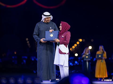 President His Highness Sheikh Mohamed Bin Zayed Al Nahyan awards Zayed Sustainability Prize to Sumiya Bibi, an orphan student at KORT Education in Pakistan.