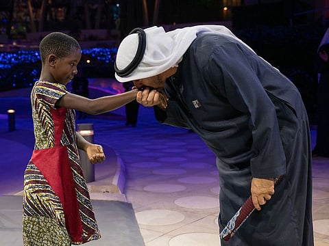 UAE President His Highness Sheikh Mohamed bin Zayed Al Nahyan receives Mary Zayed, named after the late Sheikh Zayed bin Sultan Al Nahyan, at the Zayed Sustainability Prize ceremony at Expo City Dubai on Friday