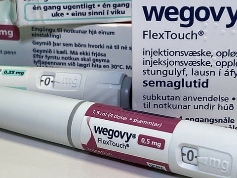 Injection pens and boxes of Novo Nordisk's weight-loss drug Wegovy are shown in this photo illustration in Oslo, Norway, November 21, 2023.