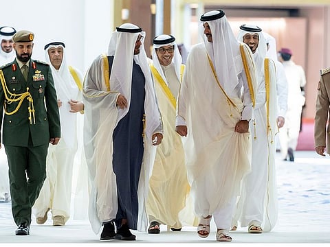 Sheikh Mohamed with Sheikh Tamim after he arrived in Doha on December 5, 2023.