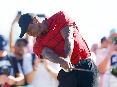 Tiger Woods of the United States plays his shot from the 15th tee during the final round of the Hero World Challenge.