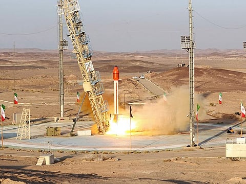 This photo released by the Iranian Defence Ministry on Wednesday claims to show a rocket with a capsule carrying animals is launched from an undisclosed location into orbit, in Iran.