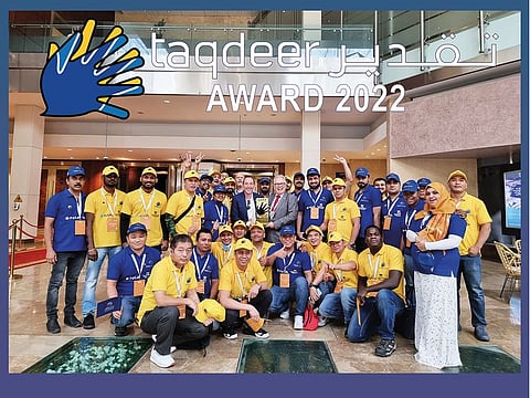 Workers from one of the winning companies gather at the 2022 award cycle of Taqdeer Award. Picture usef for illustrative purposes only.
