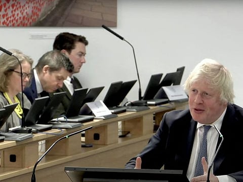 Former British Prime Minister Boris Johnson gives evidence at the COVID-19 Inquiry, in London, Britain, December 7, 2023 in this screen grab obtained from a handout video. UK Covid-19 Inquiry