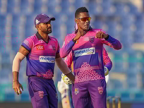 New York Strikers spinner Akeal Hosein celebrates his five-wicket haul, including a hat-trick, against Samp Army in Qualifier 1.