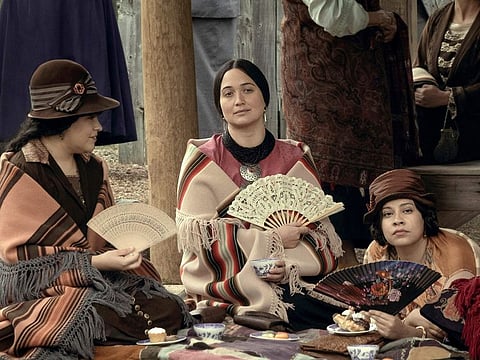 This image released by Apple TV+ shows, from left, JaNae Collins, Lily Gladstone, and Cara Jade Myers in a scene from "Killers of the Flower Moon."