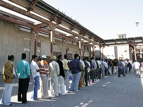 People queue up outside the Shiva Temple at Bur Dubai Creek.
