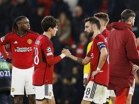 Manchester United's Facundo Pellistri and Bruno Fernandes look dejected after the Champions League Group A match against Bayern Munich at Old Trafford, Manchester, on Tuesday.