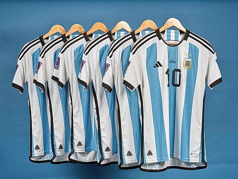 This undated photo courtesy of Sotheby's shows Lionel Messi's set of six match worn shirts from the 2022 FIFA World Cup.