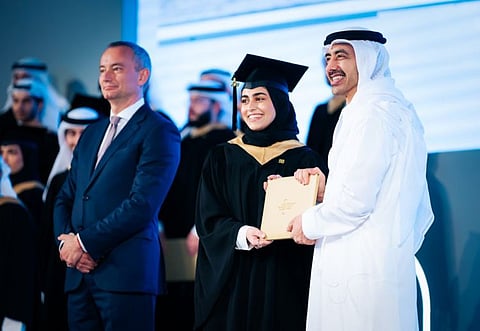 Sheikh Abdullah bin Zayed Al Nahyan handing over the certificate to the graduation ceremony at Anwar Gargash Diplomatic Academy in Abu Dhabi.