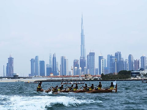 The Al Maktoum traditional rowing race with the picturesque Burj Khalifa at the backdrop.