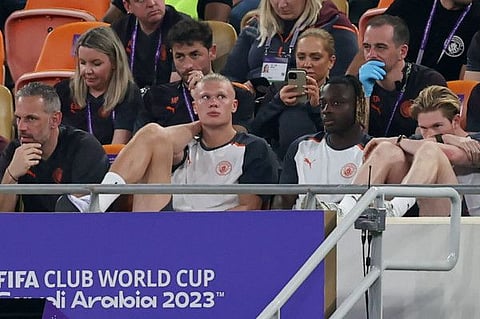 Manchester City's striker Erling Haaland (second left), midfielder Jeremy Doku and midfielder Kevin De Bruyne (right) watch the Fifa Club World Cup football semi-final match at King Abdullah Sports City in Jeddah on Tuesday.