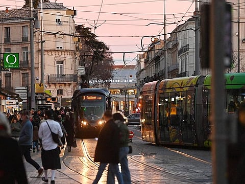 Photograph shows tramways running on tracks in Montpellier, southern France. Montpellier, starting on 21 December, became the largest metropolis in France to offer free public transport to its 500,000 inhabitants.