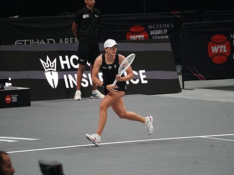 Iga Swiatek of TSL Hawks in action against Elena Rybakina of HonorX Falcons in the World Tennis League at the Etihad Arena , Yas Island, in Abu Dhabi.