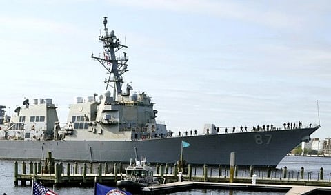 The USS Mason, an Arleigh Burke-class destroyer, passes a dock in Norfolk, Virginia, on April 8, 2021. Officials said the USS Mason shot down a suspected Al Houthi drone flying in its direction during an incident.