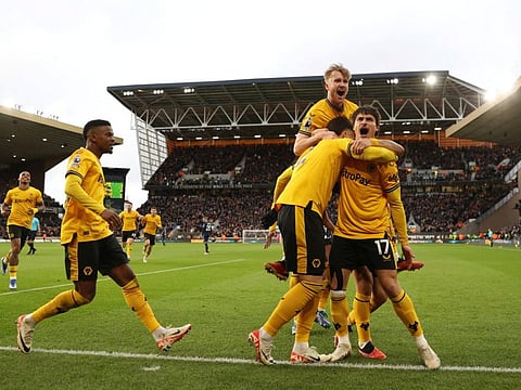 Wolverhampton Wanderers' Matt Doherty celebrates scoring their second goal with teammates during their Premier League match against Chelsea at the Molineux Stadium, Wolverhampton, on Sunday.