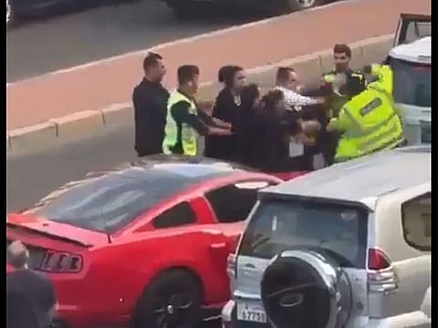 Parents of the youth and policemen engaged in a fight.