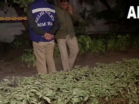 Investigators at the site in New Delhi.