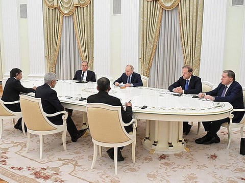 In this pool photograph distributed by Russian state agency Sputnik, Russia's President Vladimir Putin (C) attends a meeting with India's Foreign Minister Subrahmanyam Jaishankar (2nd L) in Moscow on December 27, 2023.