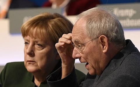 Merkel and Schaeuble at the general party conference of the Christian Democratic Union, CDU, in Essen, Germany, on December 7, 2016.