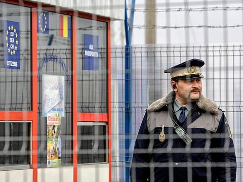 File photo: A Romanian border police officer stands guard at the railway border crossing point between Romania and Moldova in Ungheni, Romania. Bulgaria and Romania have received permission to join Europe’s passport- and visa-free Schengen Area starting in March, the governments of the two countries said.