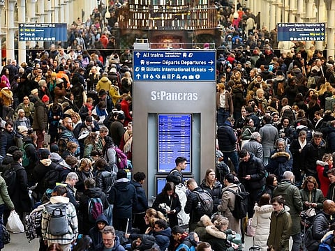 Passengers gather at the departure gates of the Eurostar terminal at St Pancras International Station.