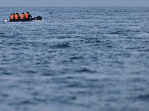 Migrants travel in an inflatable boat across the English Channel. (File photo)