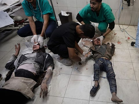 Palestinians wounded in the Israeli bombardment of the Gaza Strip receive treatment at the Nasser hospital in Khan Younis, Southern Gaza Strip, on December 31, 2023.