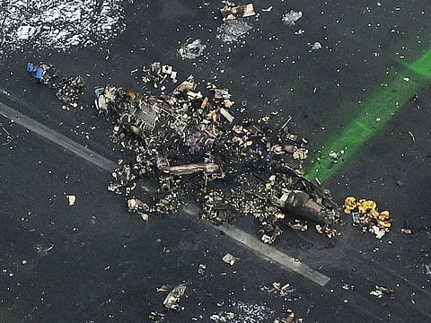 Burnt Japan Coast Guard aircraft after a collision with Japan Airlines' (JAL) Airbus A350 plane at Haneda International Airport in Tokyo.