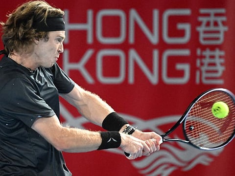 Russias Andrey Rublev plays a backhand return to Britains Liam Broady during their men's singles tennis match at the Hong Kong Open on Thursday.