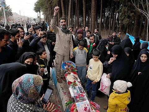 People chant slogans at the scene of Wednesday's bomb explosion in the city of Kerman, about 820 kms southeast of the capital Tehran, on Thursday, January 4, 2024.