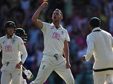 Australias Josh Hazlewood (centre) celebrates after dismissing Pakistans Sajid Khan during day three of the third Test in Sydney on Friday.