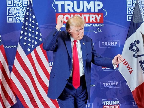 Former US President and Republican presidential candidate Donald Trump campaigns, in Sioux Center, Iowa, on January 5, 2024.