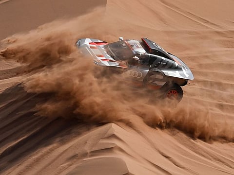 Team Audi Sport's French driver Stephane Peterhansel and his French co-driver Edouard Boulanger steer their car during Stage 2 of the Dakar Rally in Saudi Arabia on Sunday.