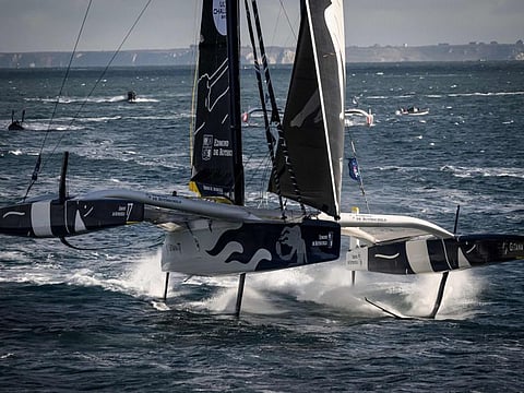 French skipper Charles Caudrelier sails his Ultim multihull Gitana - Edmond de Rothschild after the start of the Arkea Ultim Challenge, a solo round-the-world race on a multihull, off the coast of Brest, on January 7, 2024. The Arkea Ultim challenge around-the-world-solo sailing race will start in Brest, western France, on Sunday.