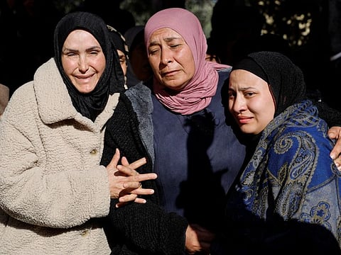 Palestinian women attend a funeral for Palestinians who were killed in an Israeli air strike in Jenin in the Israeli-occupied West Bank, on January 7, 2024.