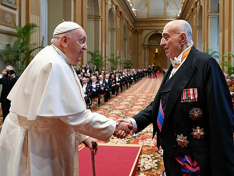Pope Francis greets a member of the diplomatic corps accredited to the Vatican on January 8, 2024.