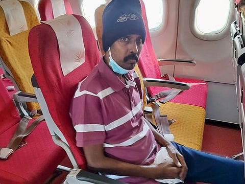 Undocumented Indian expat Sunil Kumar OV, 47, flies home from the UAE after 18 years. He was reportedly plagued by financial and health crises.