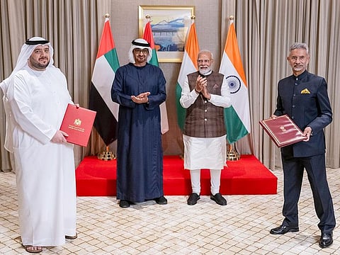 President Sheikh Mohamed bin Zayed Al Nahyan and India PM Narendra Modi witness a Memorandum of Understanding (MoU) exchange ceremony at The Leela Gandhinagar hotel. Also seen are: Mohamed Hassan Al Suwaidi, UAE Minister of Investment (front left) and Dr Subrahmanyam Jaishankar, Minister of External Affairs of India.
