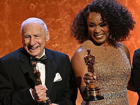 US actor Mel Brooks (L) and US actress Angela Bassett pose with their Academy Honorary Award.
