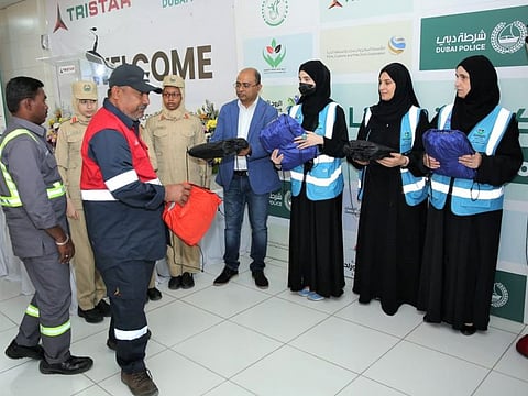 'Winter Initiative' for Dubai workers carried out by the Positive Spirit Initiative, the General Department of Human Rights, Jebel Ali Police Station, the Safety Ambassadors, in collaboration with the ‘Thanks for your Giving’ team, and the Ports, Customs and Free Zone Corp.