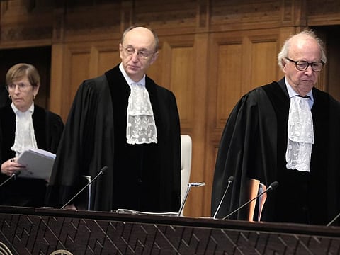 Judges enter the room during the opening of the hearings at the International Court of Justice in The Hague, Netherlands, on January 11, 2024.