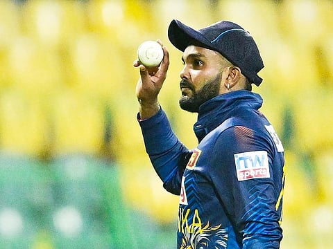 Sri Lanka's Wanindu Hasaranga celebrates after taking seven wickets during the third and final ODI match against Zimbabwe at the R. Premadasa Stadium in Colombo on January 11, 2024.