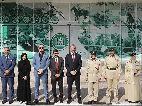 Dubai Police and representatives from Genesis-UAE Juma Al Majid on the sidelines of the signing ceremony for the initiative recently
