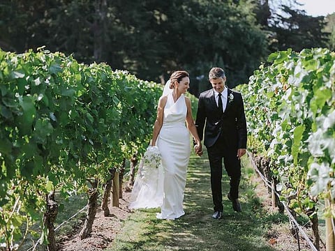 In this image supplied by Dame Jacinda Ardern and Clarke Gayford, former New Zealand Prime Minister Jacinda Ardern embraces her husband Clarke Gayford at their wedding in Havelock North, New Zealand, Saturday, Januray 13, 2024.